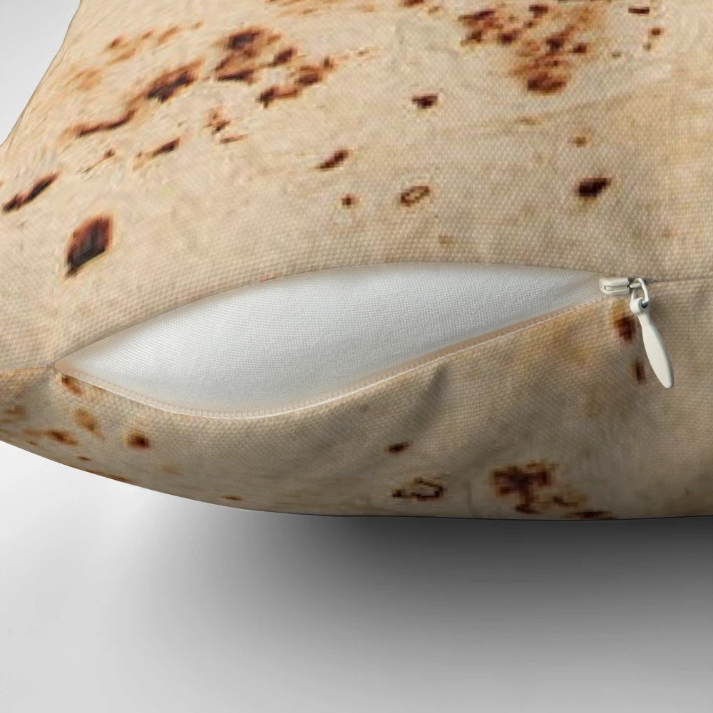 Realistic-looking tortilla-shaped pillow for a unique Mexican-themed home decor accent.