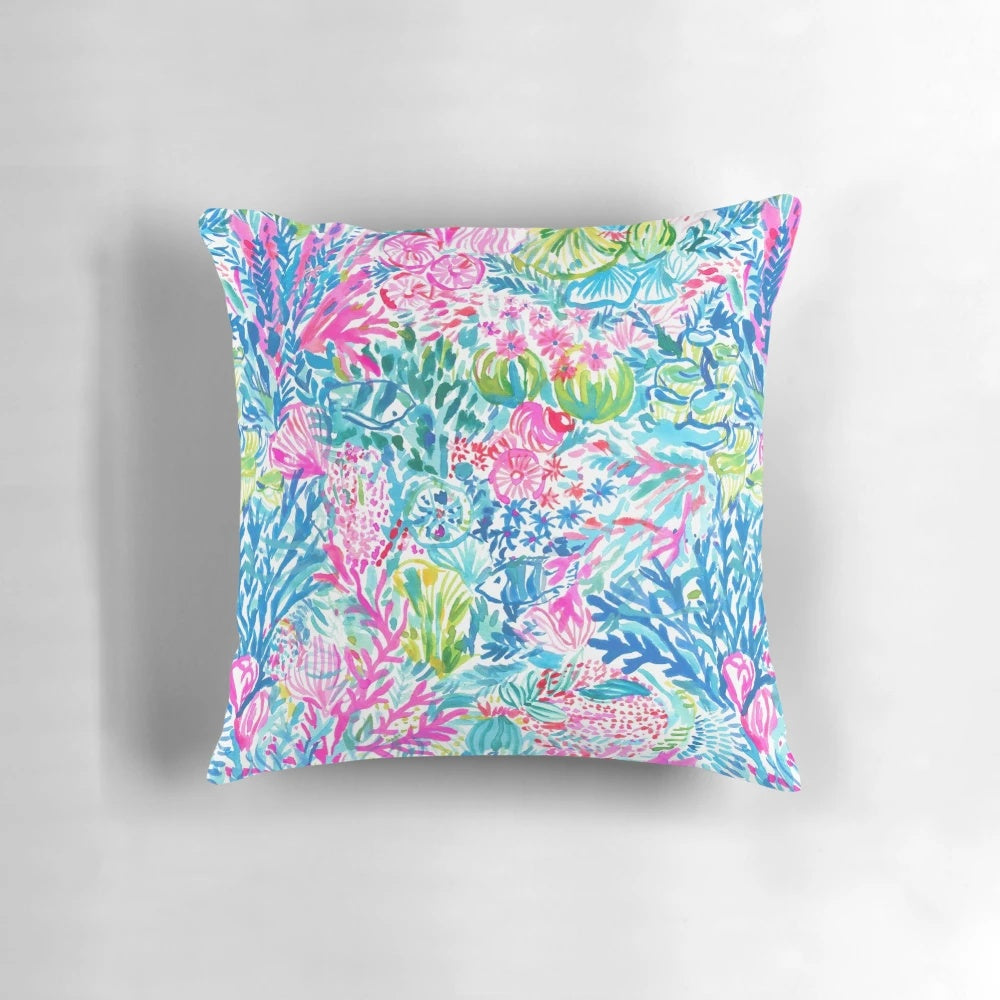 Lilly Pulitzer inspired pillow with a summer lily and ocean holiday design