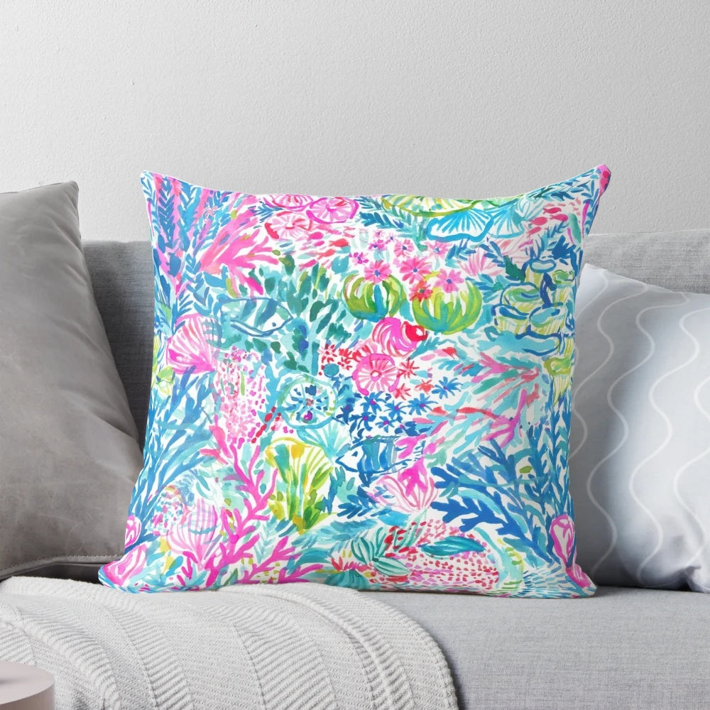 Lilly Pulitzer inspired pillow with a summer lily and ocean holiday design