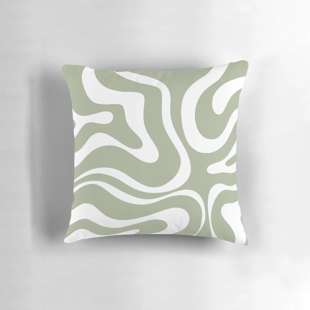 Liquid swirl abstract pattern in sage green and white on a plush pillow