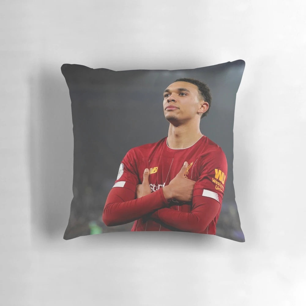 A cozy decorative pillow featuring the iconic image of Liverpool FC player Arnold
