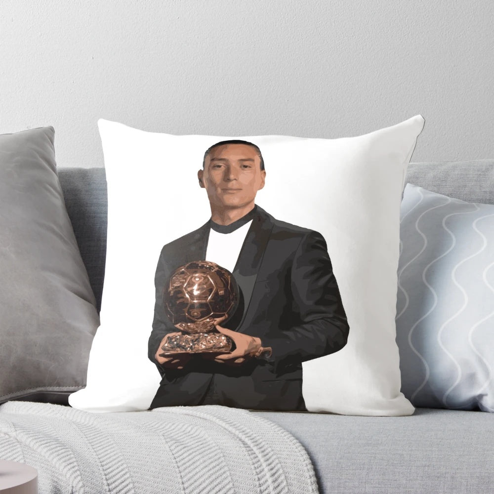 A playful throw pillow featuring an illustration of Liverpool FC player Darwin Nunez.