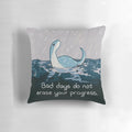 A cozy rainy day pillow featuring the Loch Ness Monster "Nessie" for mental health and wellness.