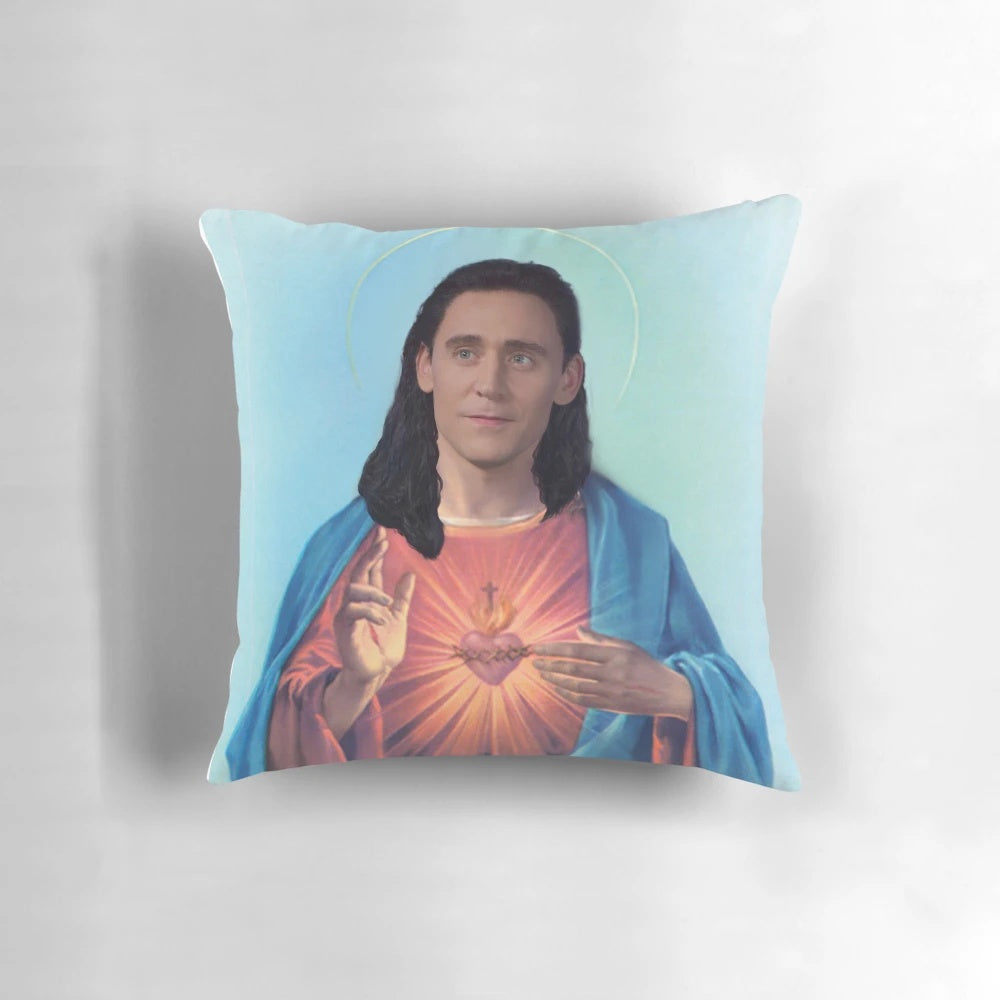 Artwork of Tom Hiddleston as Loki in a Jesus-style portrait on a plush pillow.