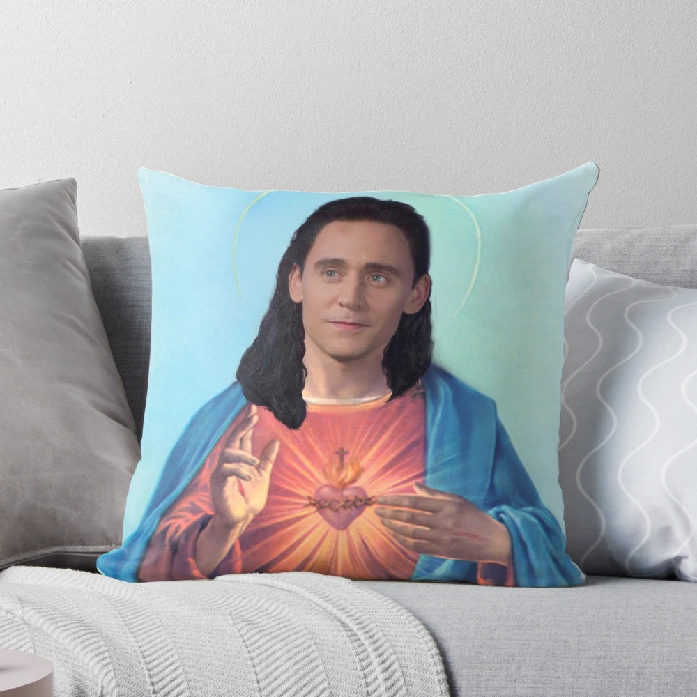 Artwork of Tom Hiddleston as Loki in a Jesus-style portrait on a plush pillow.