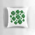 A hand-painted, 4-leaf shamrock pillow with a charming, balanced pattern