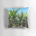 Vibrant green banana plants pillow, perfect for adding a touch of tropical flair to your living space.