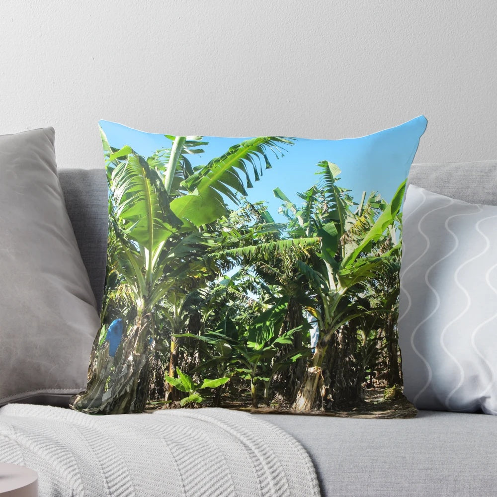 Vibrant green banana plants pillow, perfect for adding a touch of tropical flair to your living space.