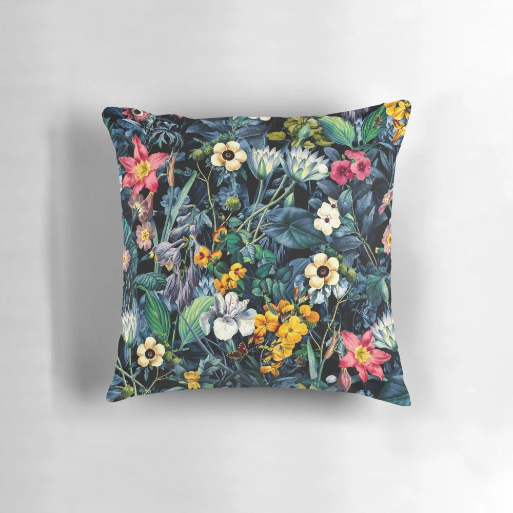 Vibrant botanical print pillow featuring a lush, tropical garden design for nature-inspired home décor