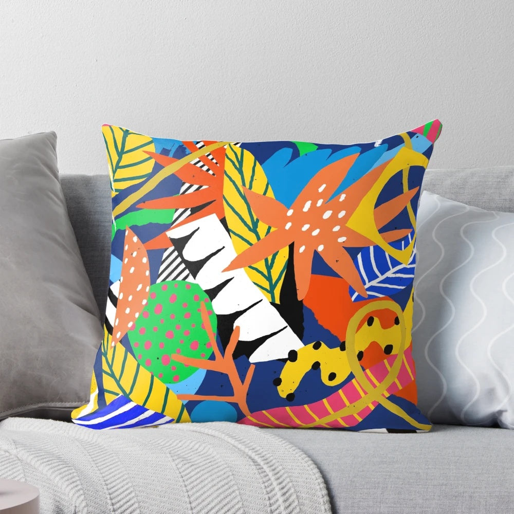 Vibrant jungle-inspired pillow with leafy, tropical pattern