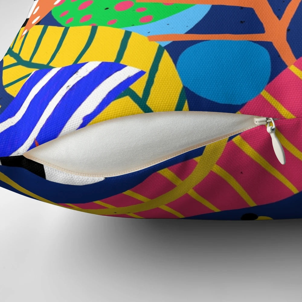 Vibrant jungle-inspired pillow with leafy, tropical pattern