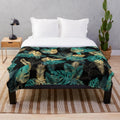 Teal and gold tropical leaves plush blanket