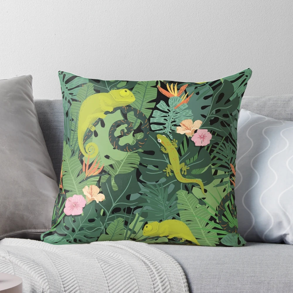 Decorative pillow featuring a vibrant tropical leaves and jungle creatures pattern in shades of green, pink, and white.