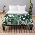 Tropical leaves plush blanket with botanical art design