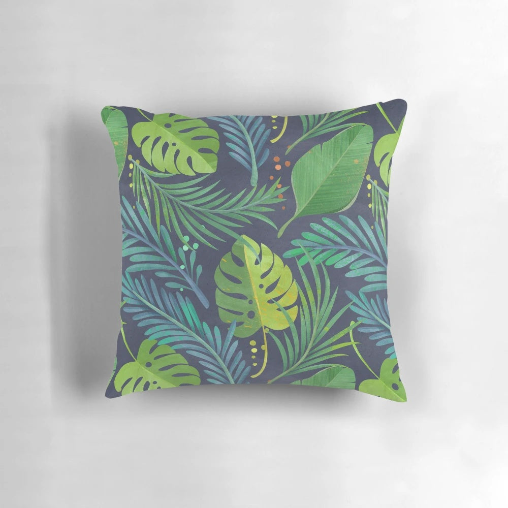 Tropical rainforest-inspired pillow featuring a vibrant botanical pattern with palm trees and banana leaves.