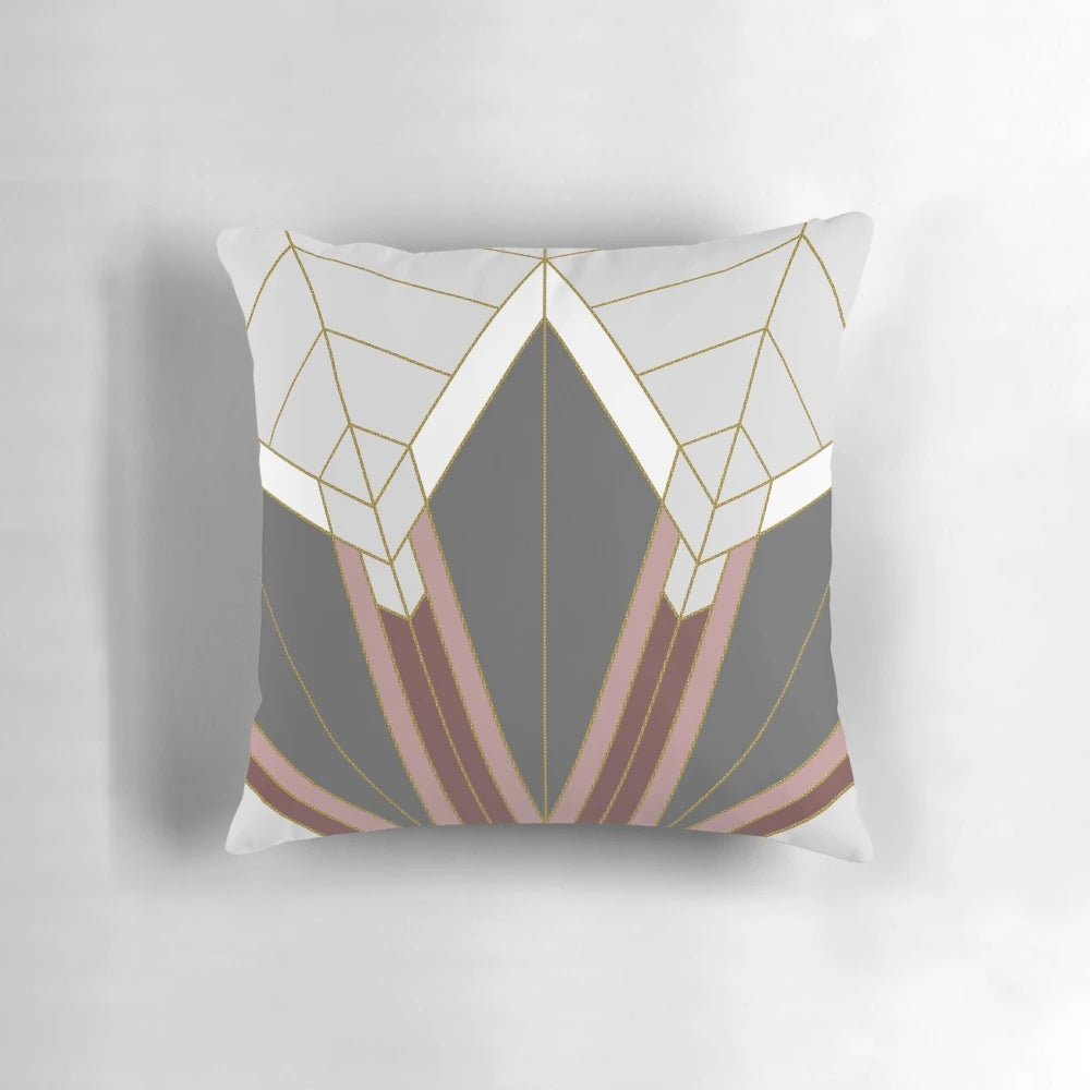 Luxurious Art Deco-inspired decorative pillow with abstract geometric design in gold and pink colors