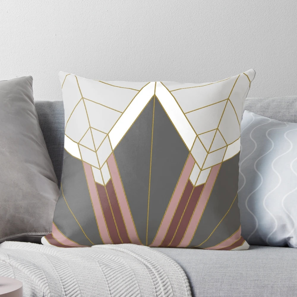 Luxurious Art Deco-inspired decorative pillow with abstract geometric design in gold and pink colors