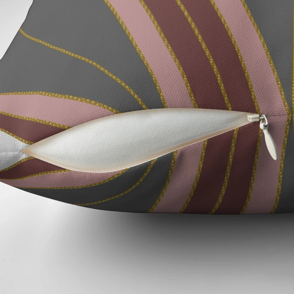 Luxurious Art Deco-inspired decorative pillow with abstract geometric design in gold and pink colors