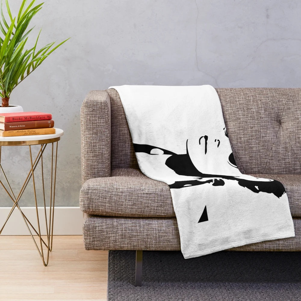 Soft, cozy plush blanket featuring iconic image of Audrey Hepburn