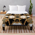Elegant golden ornamental baroque-style plush blanket