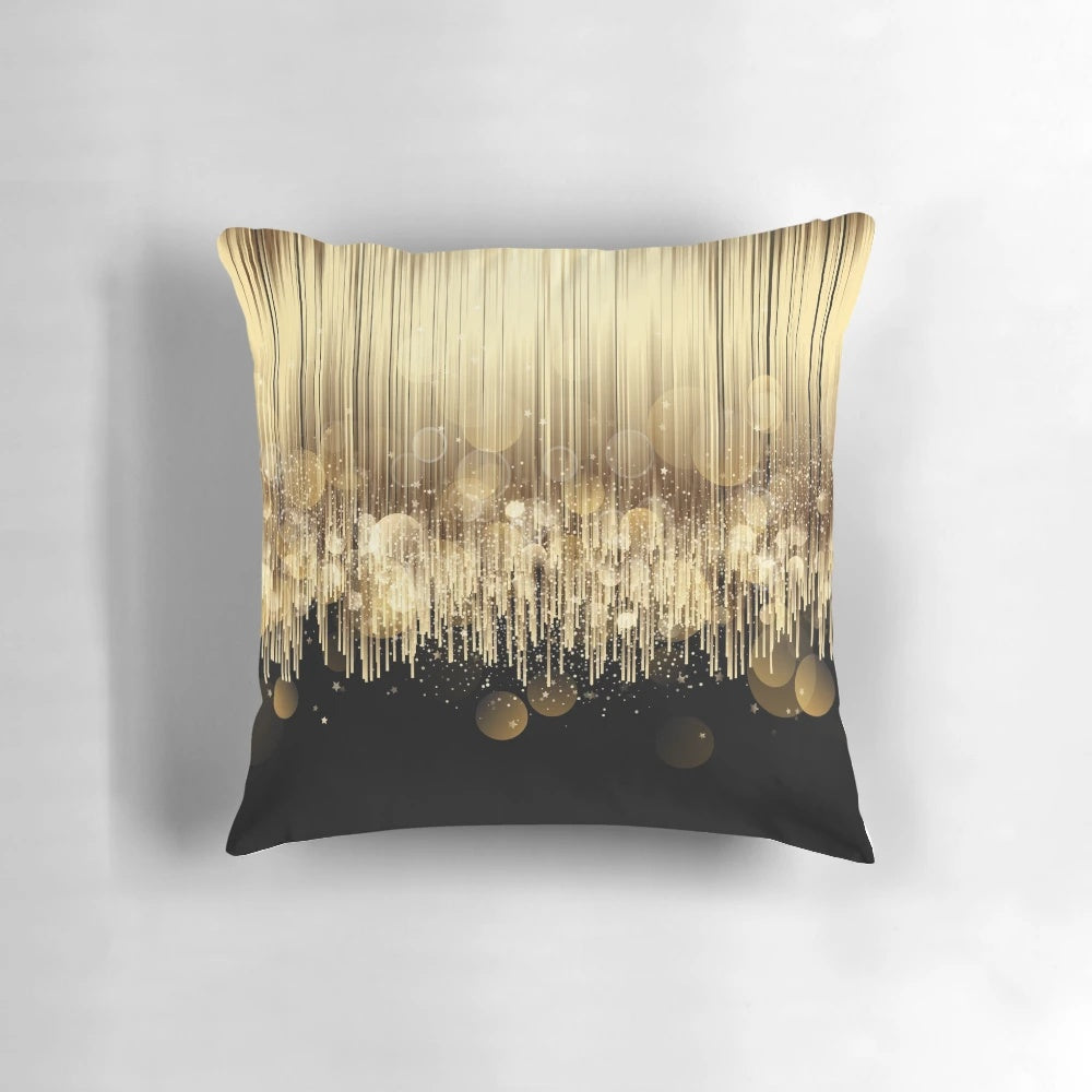 Elegant black and gold decorative pillow with a metallic sheen, perfect for adding a touch of sophistication to any room.