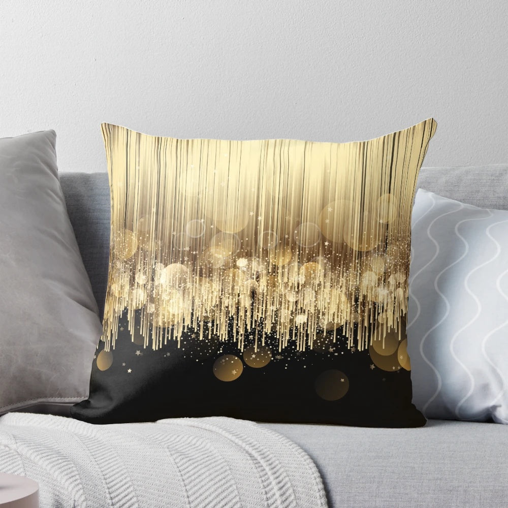 Elegant black and gold decorative pillow with a metallic sheen, perfect for adding a touch of sophistication to any room.