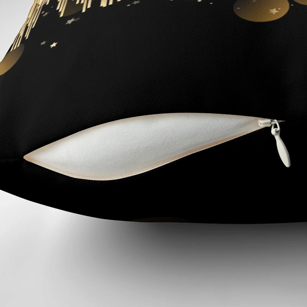 Elegant black and gold decorative pillow with a metallic sheen, perfect for adding a touch of sophistication to any room.