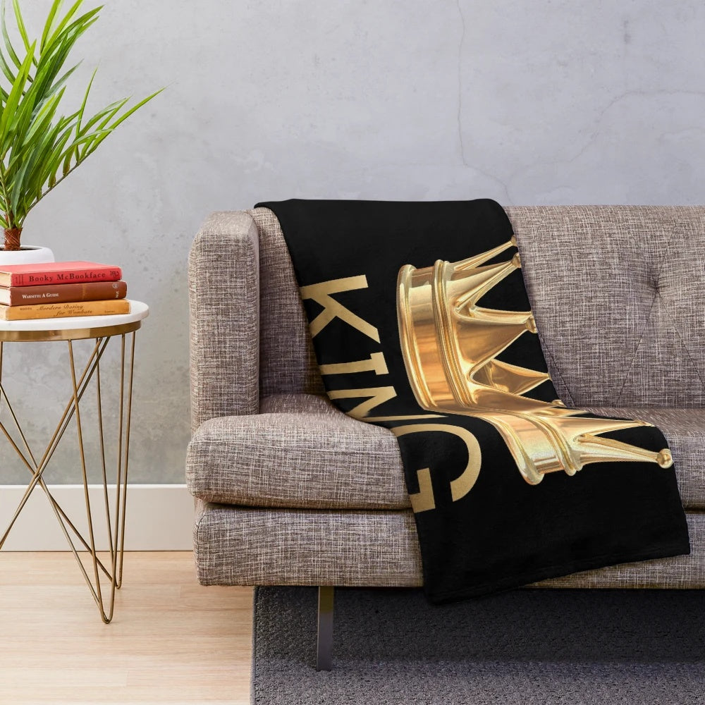 Plush black and gold crown blanket