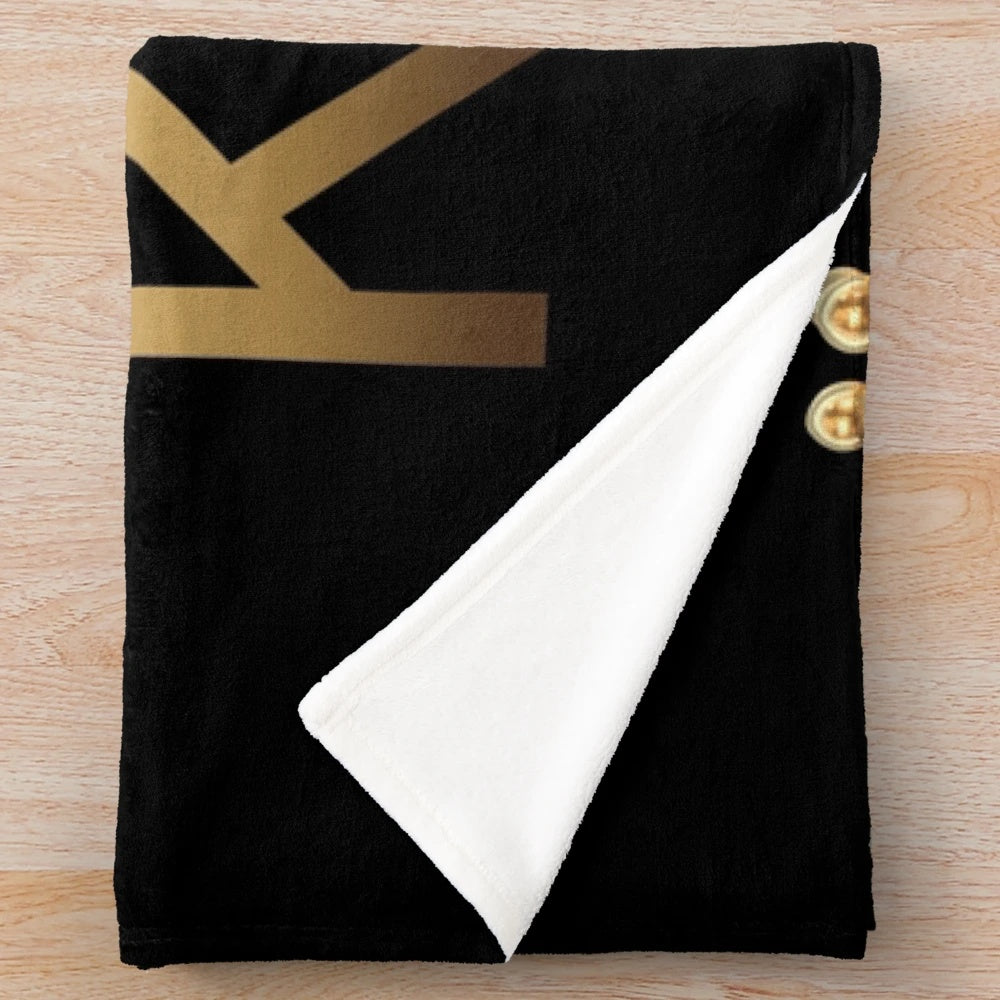 Plush black and gold crown blanket