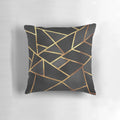 Black and gold geometric pillow with abstract marble pattern design