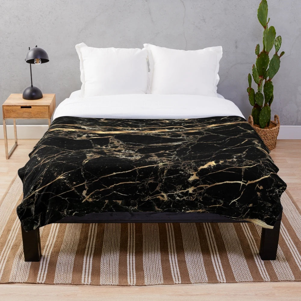 Black marble plush blanket with gold veins for soft and cozy home decor