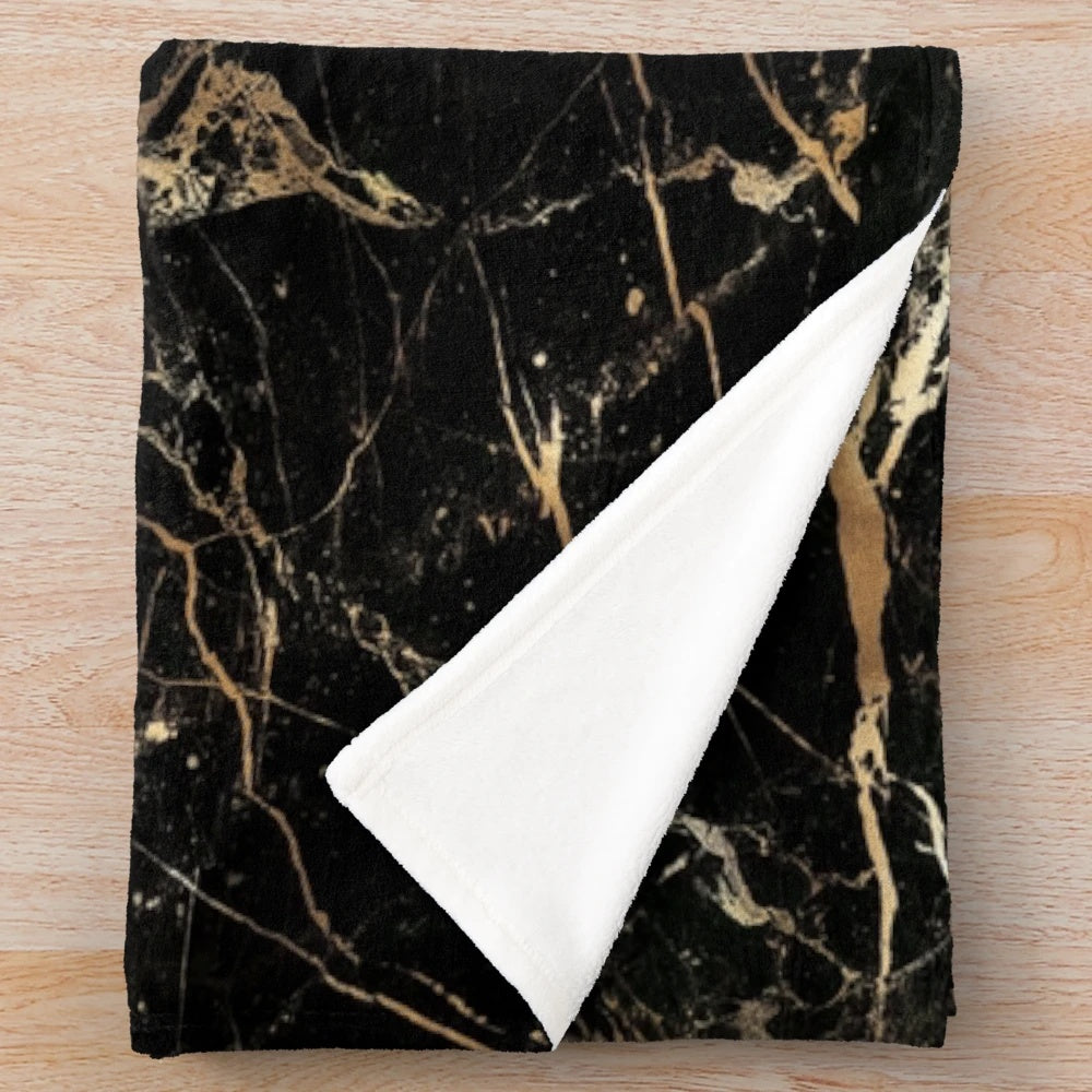 Black marble plush blanket with gold veins for soft and cozy home decor