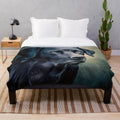 Black velvet plush blanket featuring a Labrador retriever