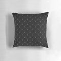 Photorealistic image of a high-quality black velvet quilted pillow with a diamond pattern design.