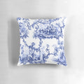 Blue and white chinoiserie toile print pillow with birds and floral pattern