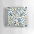 Beautiful blue floral print pillow with delicate flowers and greenery