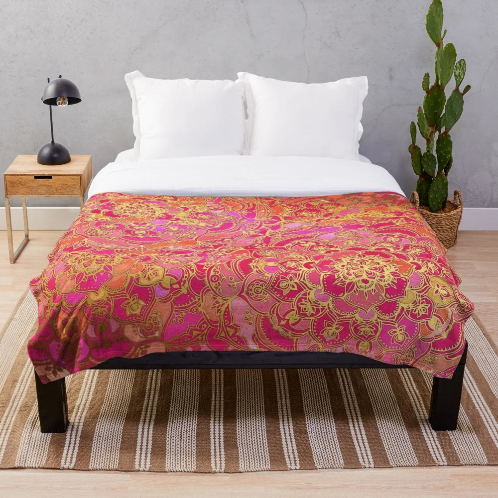 Plush bohemian-style blanket with a metallic floral pattern