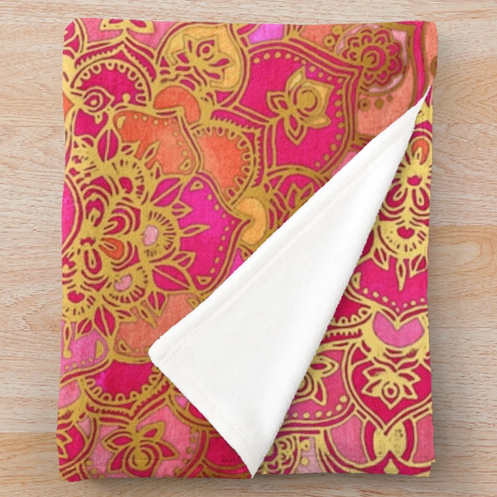 Plush bohemian-style blanket with a metallic floral pattern