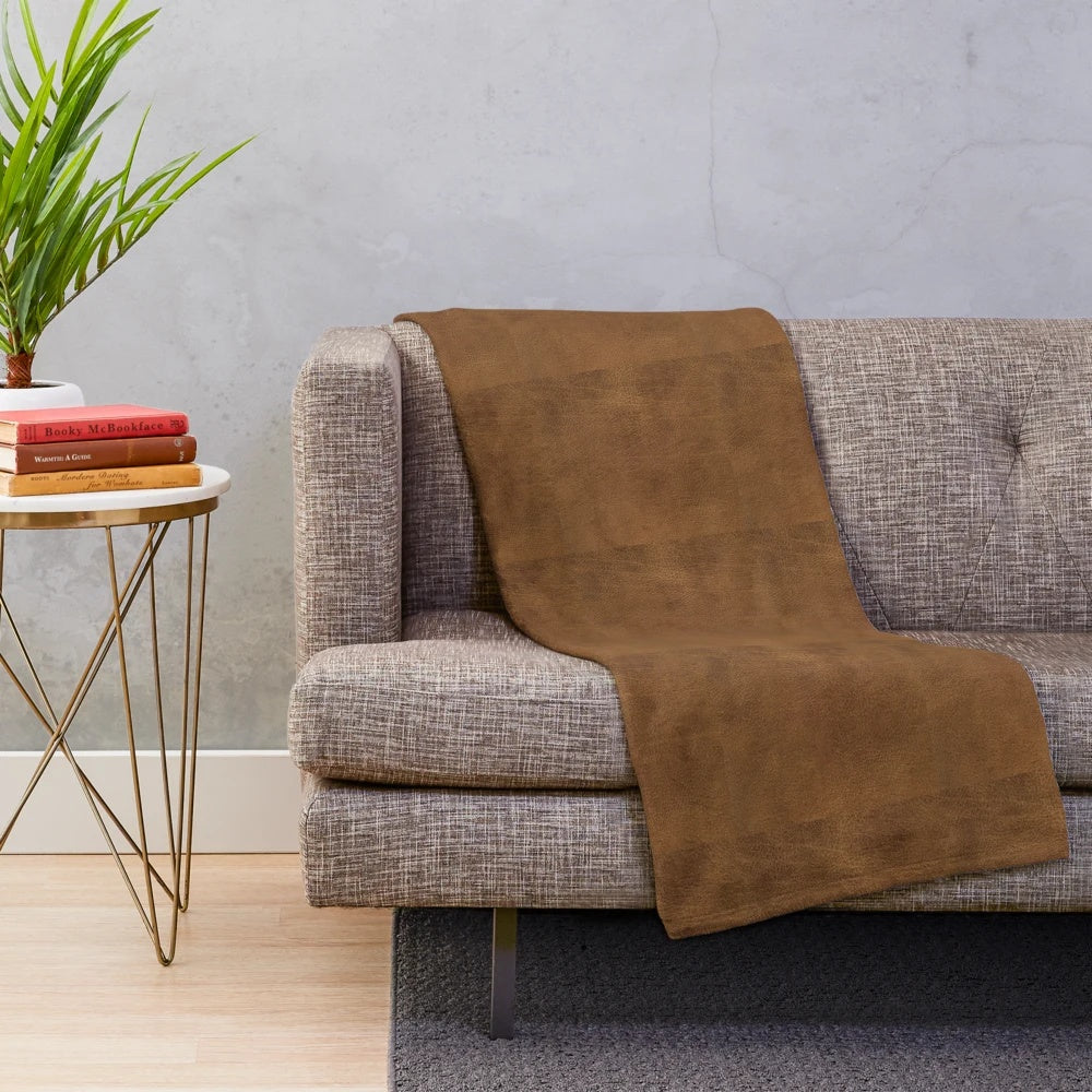 Brown leather-look plush blanket with animal print texture