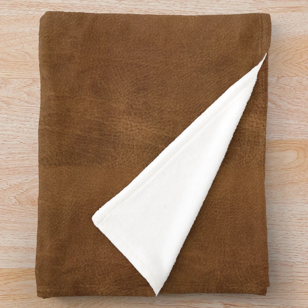 Brown leather-look plush blanket with animal print texture