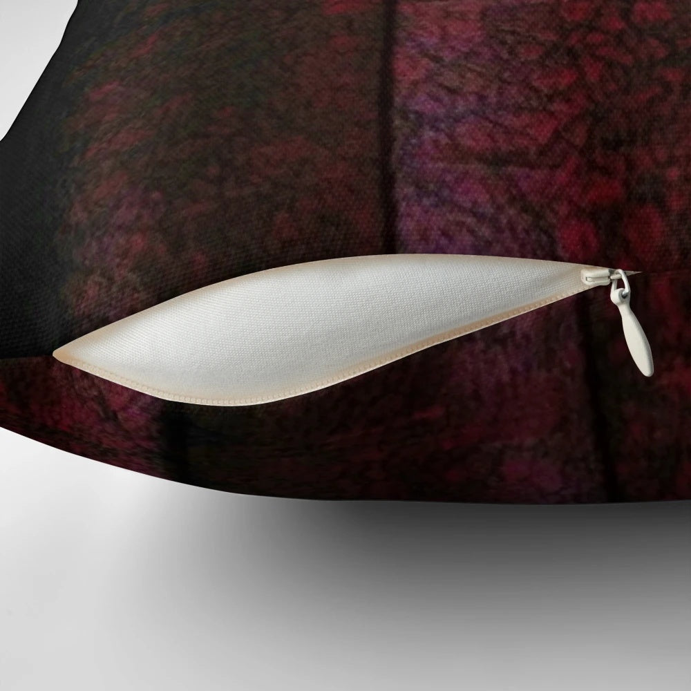 Ornate leather-bound style pillow featuring a Charles Dickens literary design