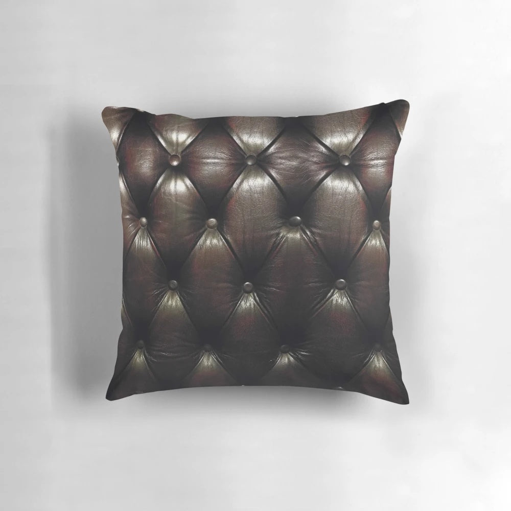 Chesterfield-inspired accent pillow with a warm, textured pattern