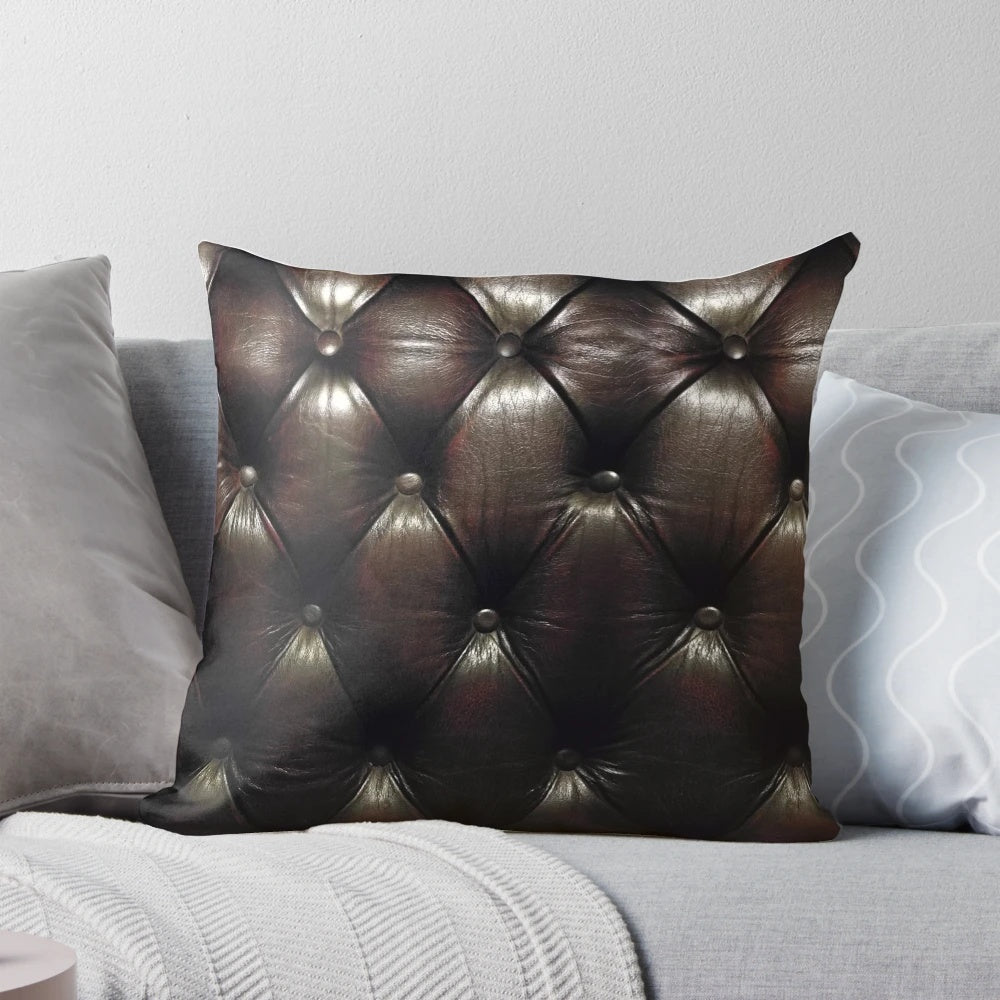 Chesterfield-inspired accent pillow with a warm, textured pattern