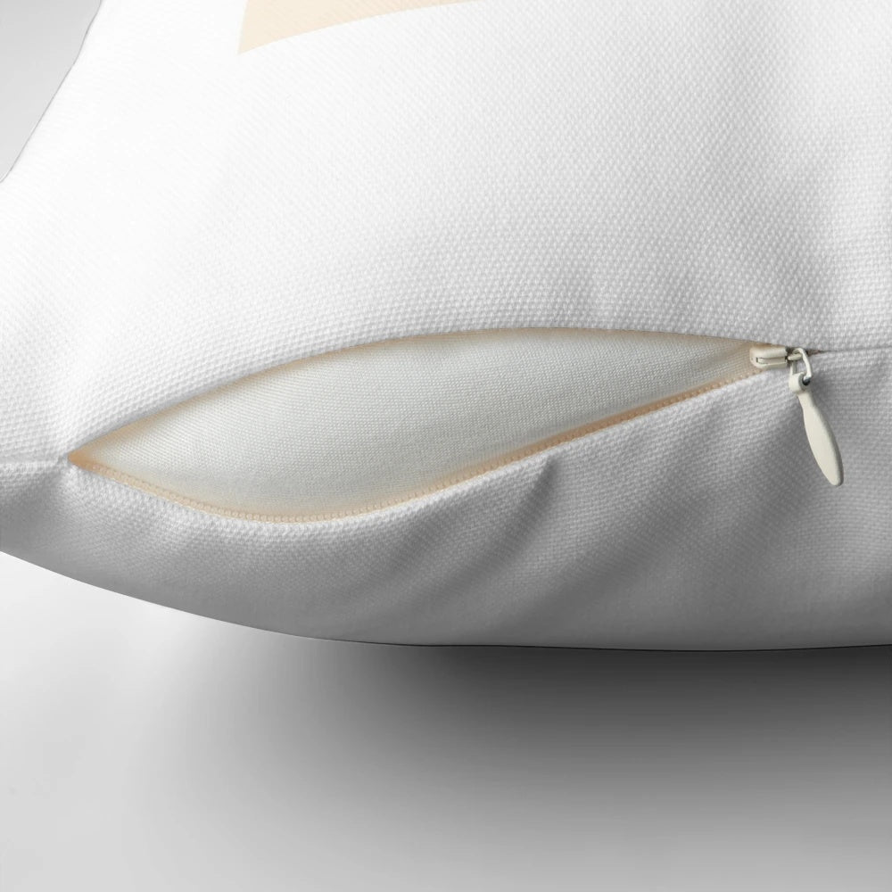 Soft and plush custard cream-colored pillow for comfortable home decor