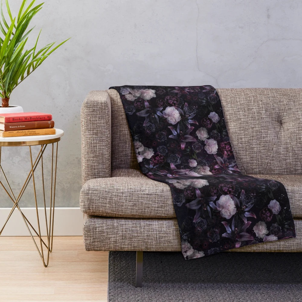 Luxurious dark floral plush blanket with a midnight black and rose design