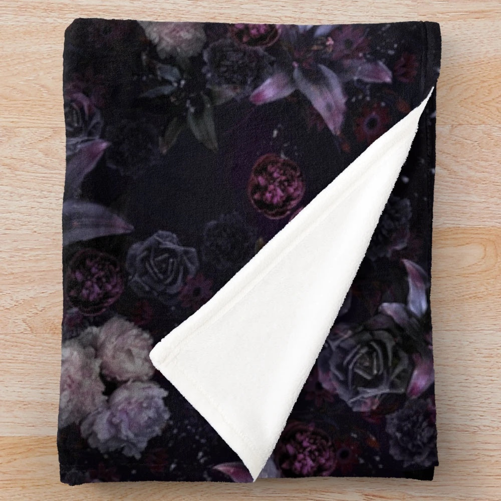 Luxurious dark floral plush blanket with a midnight black and rose design