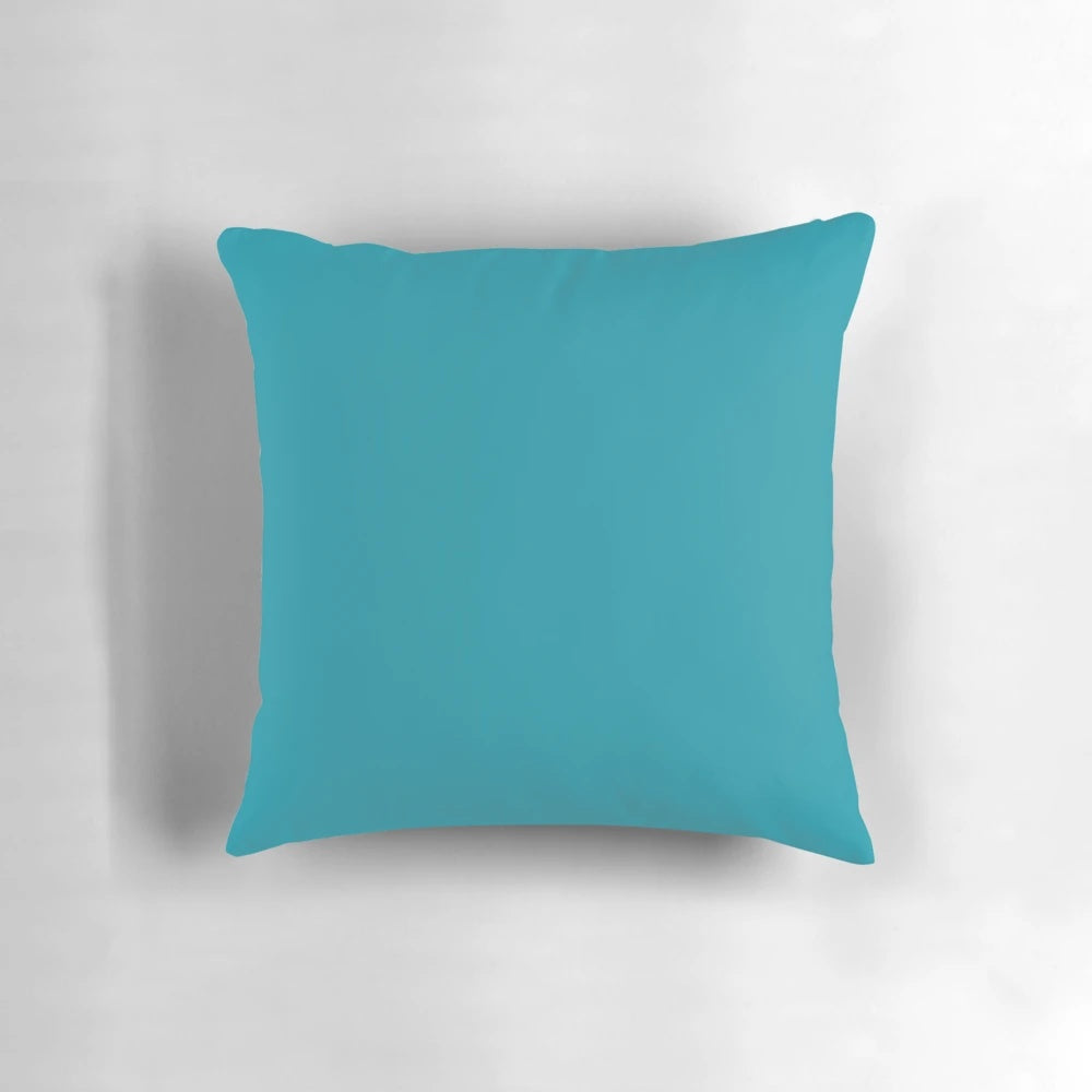 Deep teal blue and turquoise colored decorative pillow