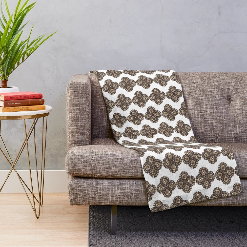 Soft, plush designer blanket with a stylish geometric pattern