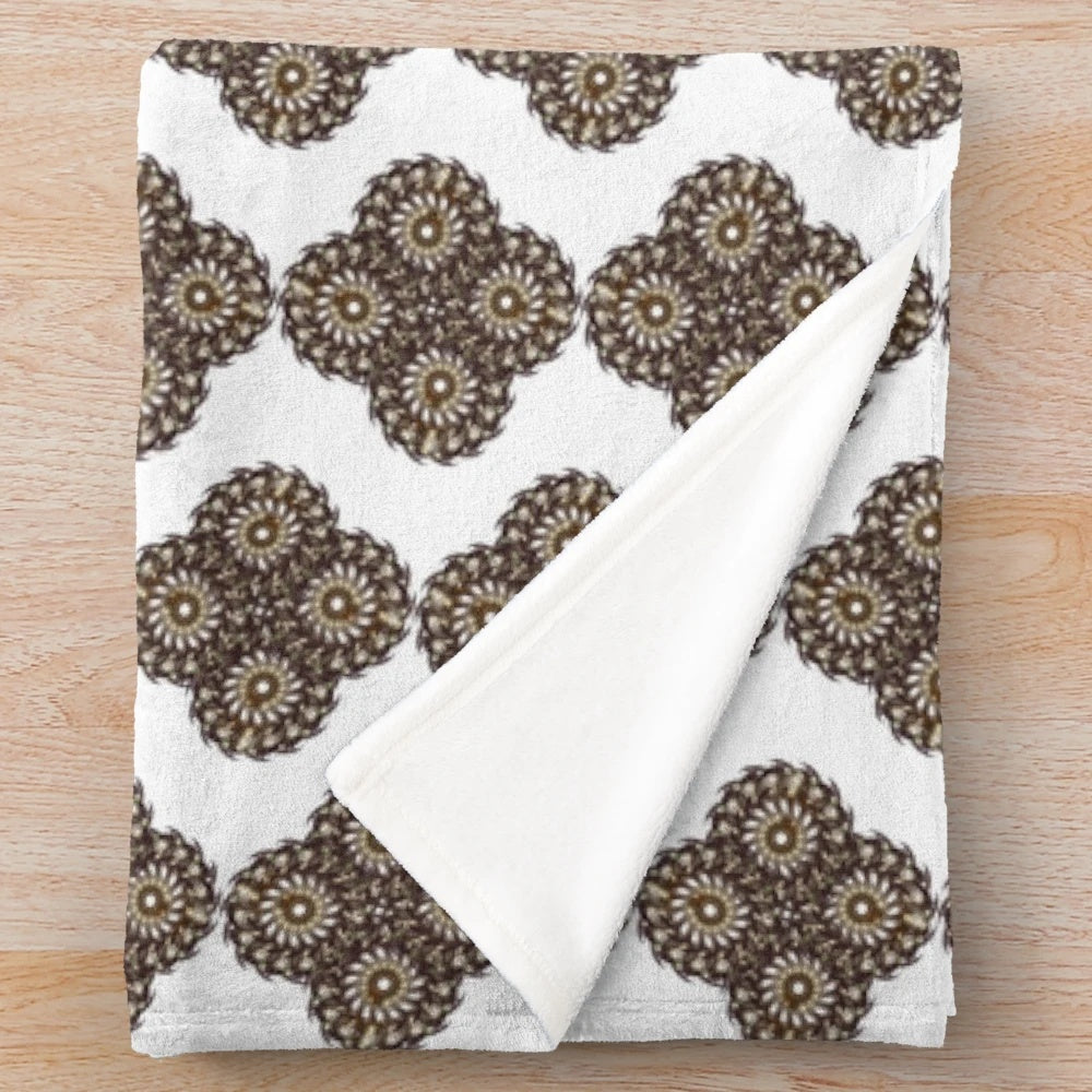 Soft, plush designer blanket with a stylish geometric pattern