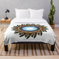Soft and stylish designer's plush blanket in a vibrant pattern